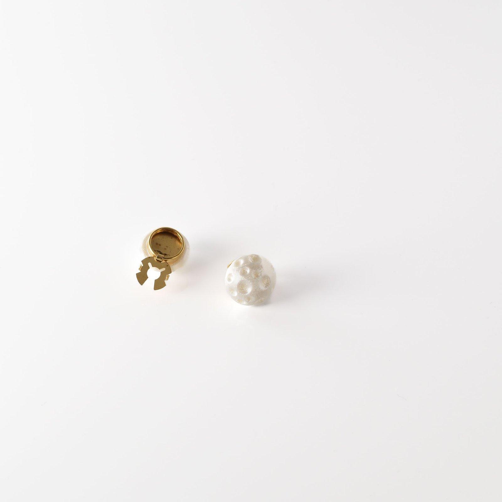 Pearl white half moon button cover detail